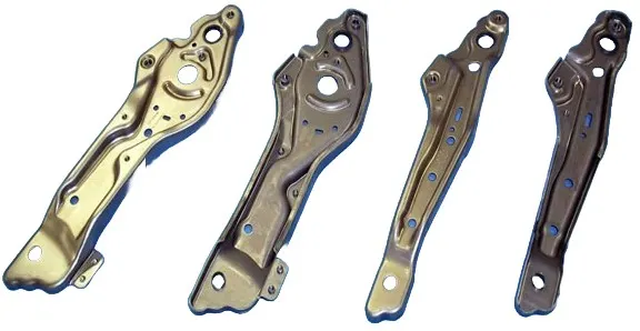 Side panels with in-die servo-tapping and bushing insertion